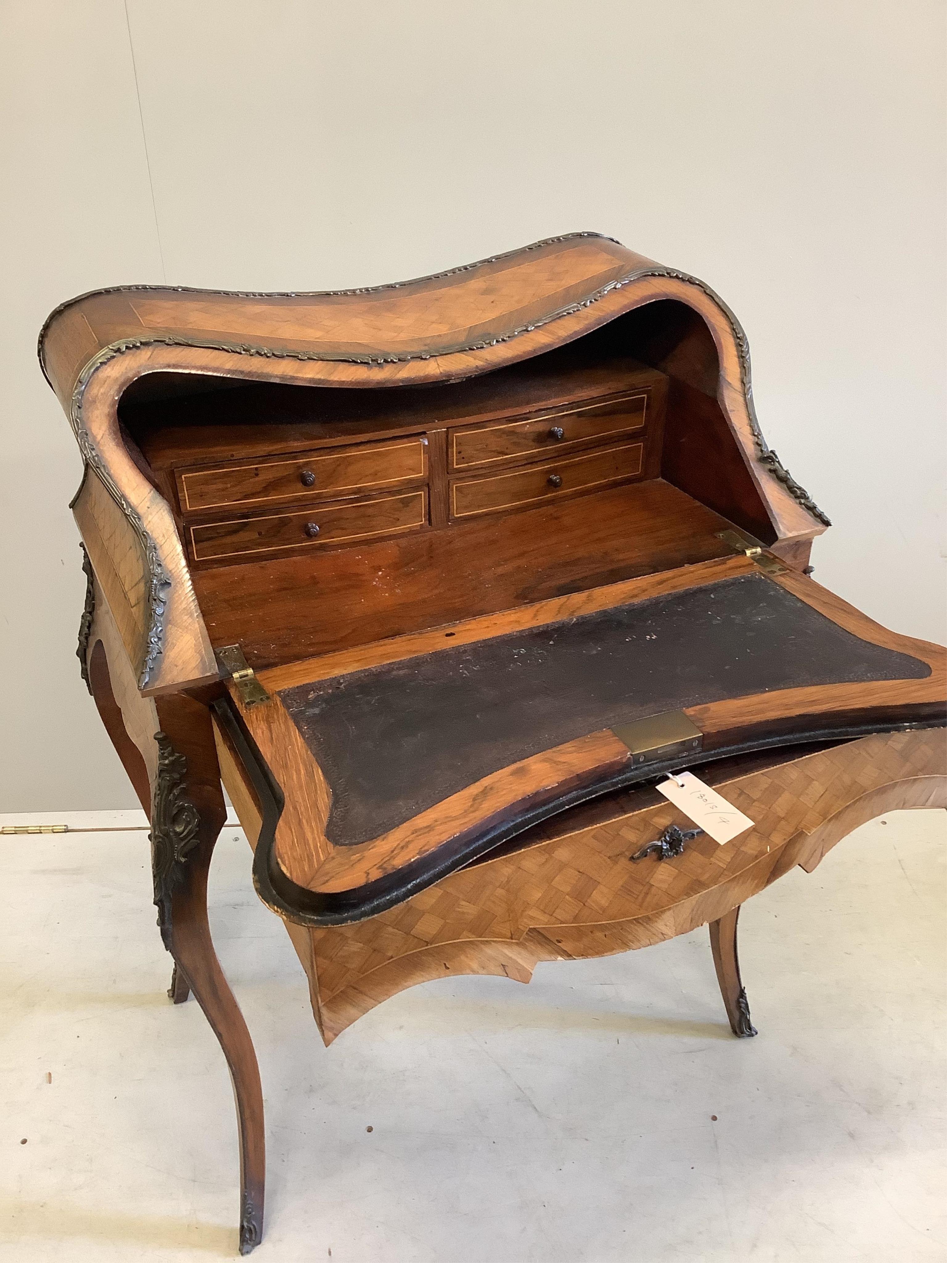 A French Transitional style gilt metal mounted kingwood bureau de dame, width 75cm, depth 46cm, height 98cm. Condition - fair